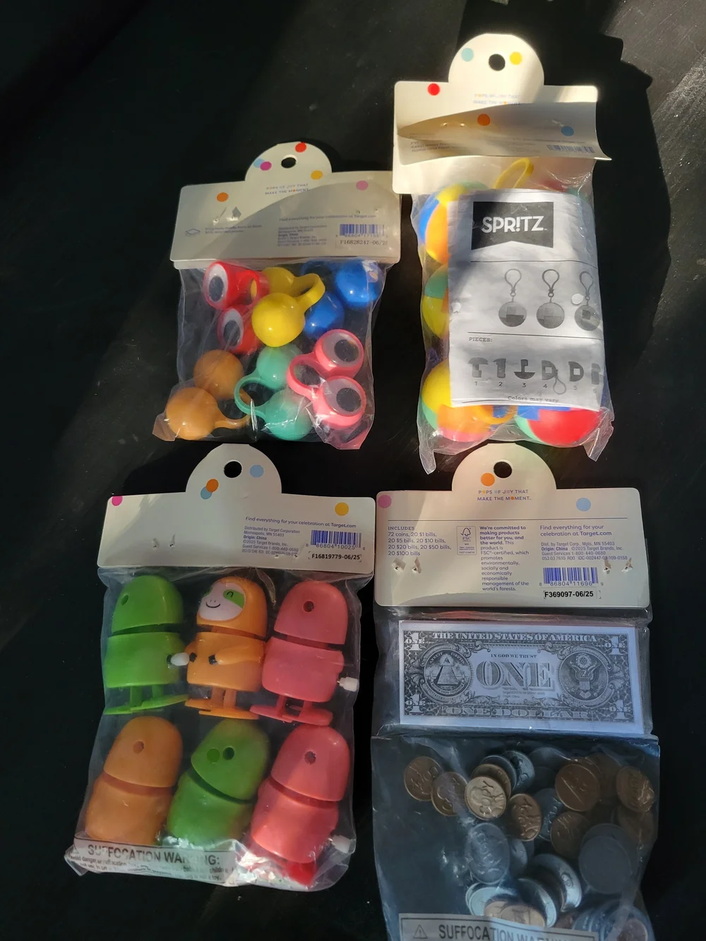 Spritz Multicolor Party Favors Pack with Balls, Rings, Coins, and Smile Toys